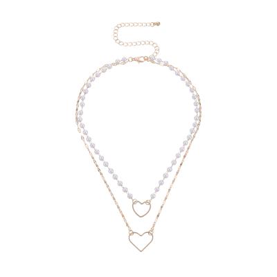 China Trendy Double-Layer Heart-Shaped Dangling Mom Women Fashion Designers White Beads Necklace for sale