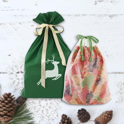 China Recyclable Colorful Custom Luxury Giant Christmas PE Logo Christmas Gift Plastic Bag From Santa Sacks for sale