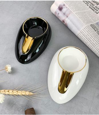 China Nordic fashion design egg shape ashtray in stock for hotel smoking ceramic ashtray for sale