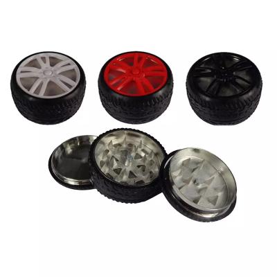 China Custom Yiwu JUJI Logo 3 Piece Herb Grinder Wholesale Design Tire Shape Zinc Portable Creative Smoke Grinders for sale