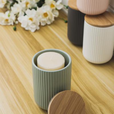 China Nordic Contemporary 2022 New Design Home Decor Decorate Table Centerpiece Holder Ceramic Candle Jar for sale