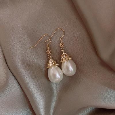 China Fashion Environmentally Friendly Women's High Sense French Tassel Drop Earrings Crystal Gold Plated Pearl Earrings Long for sale