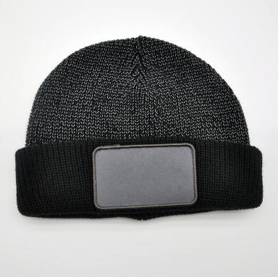 China Casual Wholesale Acrylic Knitting Reflective Beanie with Label Patch for Men and Women for sale