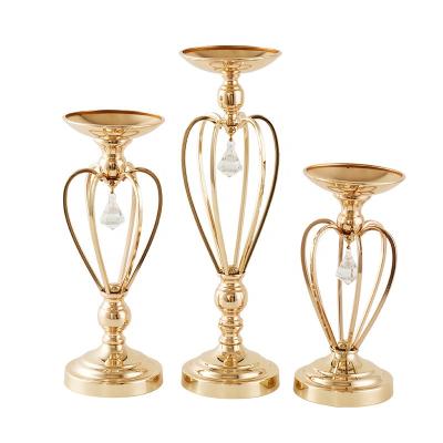 China Luxury Elegant Flexible Metal Flower Arrangement Candle Holder For Wedding Party for sale