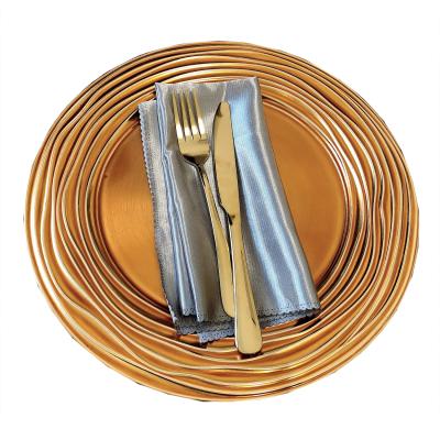 China Sustainable Round Edged Decorative Platic Charger Plates For Dining Table for sale