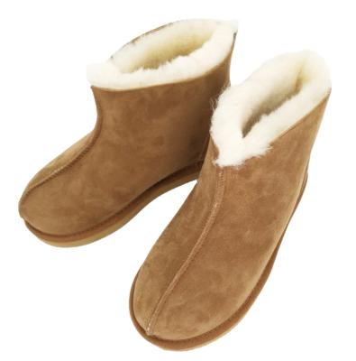 China New Design Winter Sheep Fur Thermal Boots Wool Genuine Sheepskin Boots Damping For Ladies for sale