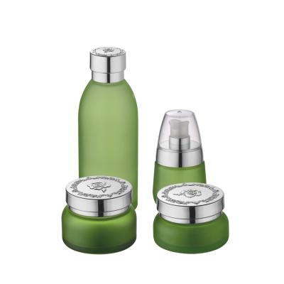 China Eco Friendly Empty Green Glass Cosmetic Bottles And Personal Care Jars 30ml 120ml Plastic Lotion Bottles With Lid for sale