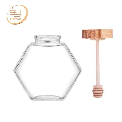 China Honey Jar Hexagonal Clear Home Viable Glass Storage Bottle Empty Jam Jar Hexagonal Clear Home For Honey With Cork Lid for sale