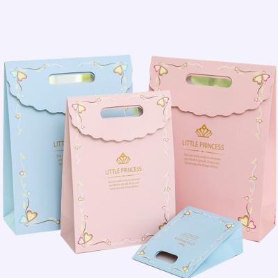 China Biodegradable Custom Candy Pink Large Reusable Packaging Tan Paper Bags Party Festive Gift Bags Wedding Christmas Gift Self Seal Bags for sale