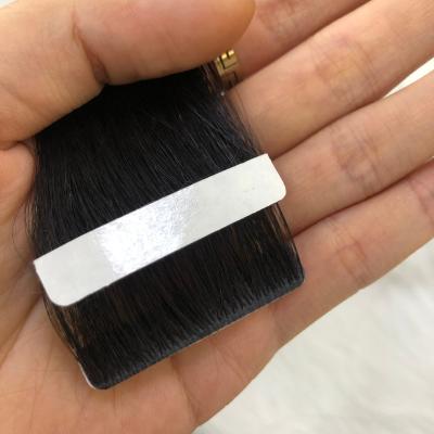 China Hand Drawn Curl 100% Natural Brazilian Remy Curly Double Tied Blonde Invisible Tape In Human Hair Extensions for sale