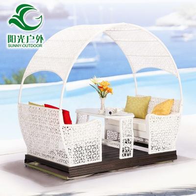 China 2021 New Environmentally Friendly Stylish Rattan Four Person Outdoor Rocking Chair Swing Chair for sale