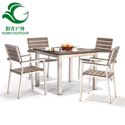 China Water Proof Garden Set Plastic Wood Furniture Aluminum Frame Restaurant Table And 4 Chairs for sale