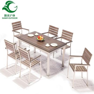 China Modern Outdoor Plastic Wood Dining Chairs And Composite Table Furniture for sale