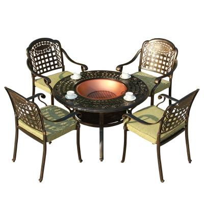 China Good Quality Modern Outdoor Table Used Fire Pit Barbecue Charcoal Cast Aluminum Dining Set Garden Tables And Chairs for sale