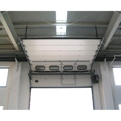 China Factory direct supply China high quality industrial overhead sectional door windproof for warehouse for sale