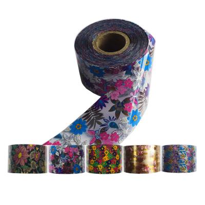 China New 100M Flower Glitter Nail fashion foil transfer paper set holographic iridescence nail sticker for sale