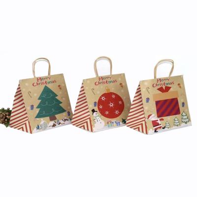 China Degradable Recycled Materials Brown Kraft Paper Bag Printing Christmas Santa Claus Pattern Gift Bag With Handle Supermarket Vegetable for sale