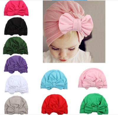 China Fashion Dobby Baby Hat With Bow Infant Baby Beanie Cap Indian Hat for sale