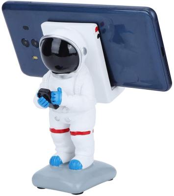 China Newest Astronaut Adjustable Creative Shape Phone Cradle Dock Durable Cell Phone Holder Desk Mounts For Phones for sale