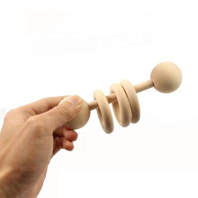 China Inflatable Toy Rattle Engraved Wooden Teething Stick Nursing Shaker Baby Wood Rings Pacifier Holder Shower Gift for sale