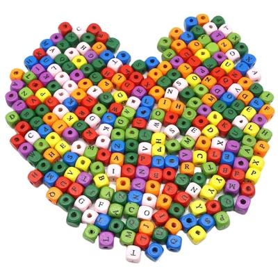 China Jewelry Making Wholesale Alphabet Wood Beaded DIY Bag Beads 8mm Colored Unfinished Letters Wooden Loose Bead Crafts for sale