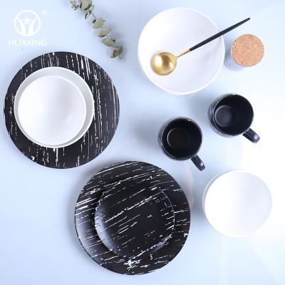 China Hot Selling 20 Pcs Restaurant Banquet Dinner Dish Set Sustainable Matte Homeware Tableware Black And White Porcelain for sale