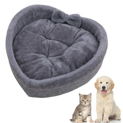 China Velvet Pet Heart Shaped Bed, Comfortable Self Warming Autumn Winter Sleeping Ultra Soft Short Plush Heart Shaped Dog Cat Mat for sale