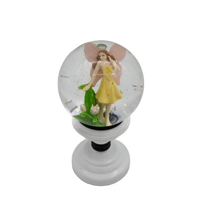 China Cinderella Snowball Snow Globe Lantern Plastic Angel Snow Globe Side Look for sale