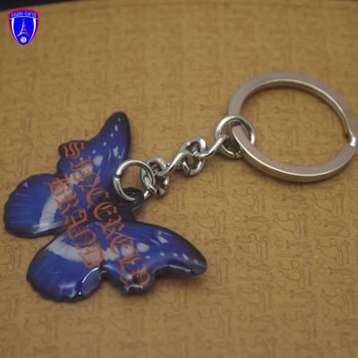 China Nice butterfly girly charm keychains promotion gift printing butterfly key chain with epoxy custom key chain toy for sale