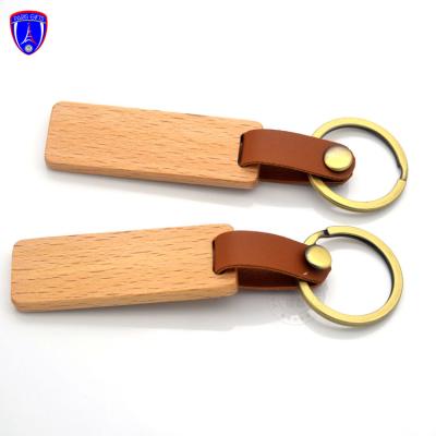 China Hot Selling Blank Rectangle Metal Wooden Key Chains With Leather Wooden Keychains for sale