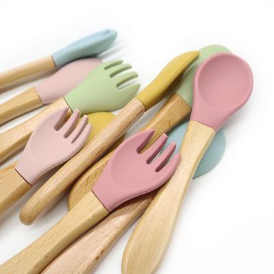 China BPA Free Cartoon Silicone Kids Spoon Fork Tableware Set 304 Stainless Steel Baby Learn To Eat Spoon Training Fork for sale