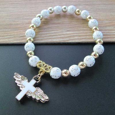 China Add Surprise and Fun to Your Party Angel Wing Cross Bracelet Baptism Favor for First Communion Baptism Bracelet Baby Shower Baptism Gift Y511 for sale