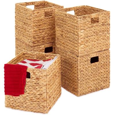 China Minimalist Promotional Natural Handmade Home Storage Straw Storage Basket With Handle for sale