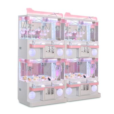 China Attractive Appearance High Quality Small Size Doll Picking Crane Machine Guangzhou Toy Clip Machine in Pink for sale