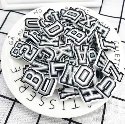 China Shoe Decoration Charms Fashion Shoe Charms Cartoon Crocs Shoe Decoration Charms and Garden Shoe Accessories Letters Alphabet Charms for Crocs for sale