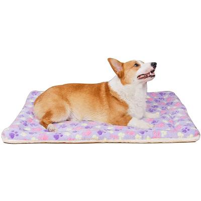 China Warm Thickened Pet Coral Cushions Flannel Fleece Blanket Waterproof Dog Blanket Fluffyet With Cute Paw Prints for sale