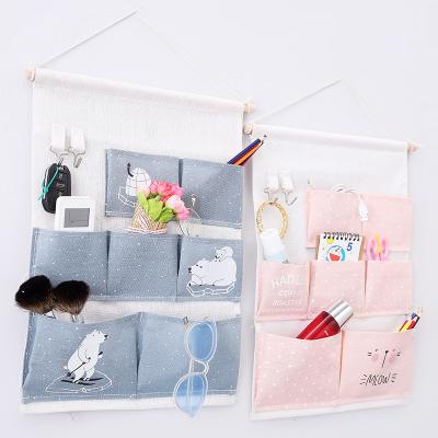 China Sustainable Hanging Pouch Bags Storage Bag Cardboard Seven Hanging Pouches Hanging Bag for sale