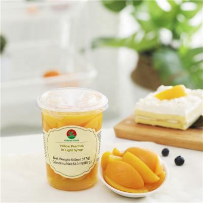 China 567g (20oz) canned food canned peach in fruit juice for sale