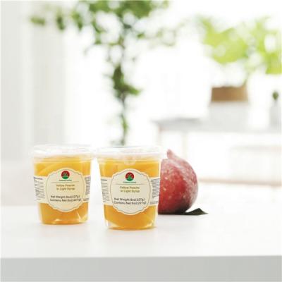 China 8oz / 227g Price Slice Canned Peach In Pear Juice In Plastic Cup for sale