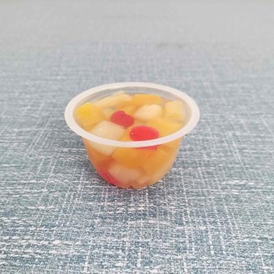 China Best selling canned 4oz/113g mixed canned fruits with cherry in light syrup in plastic cup for sale