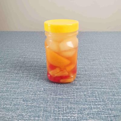 China Macedonia 575g canned fruit in syrup in the plastic jar for sale