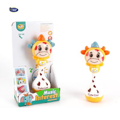 China Toy Plastic Hand Shake Toys musical Bell light up and musical cow Toy Rattle For Baby for sale