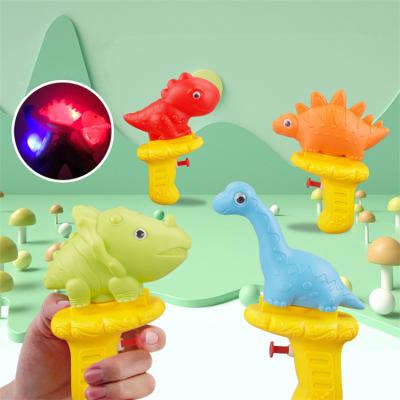 China Shoot Power Water Gun Toy Flash Light Ignition Toys Cartoon Dinosaur Plastic Kids Toys Gun Water Shooter Squirter For Young Boy for sale