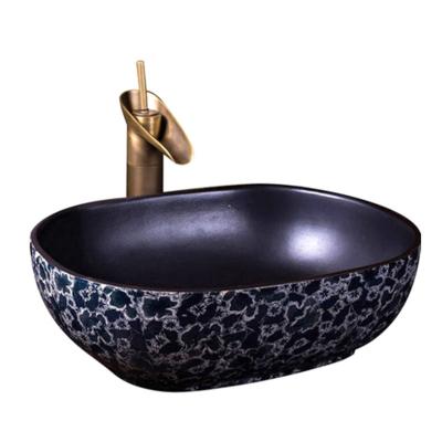 China Chinese Style Blue Black Color Antique Artistic Ceramic Oval Hand Basin Fired 1300 Degree Wash And White Design for sale