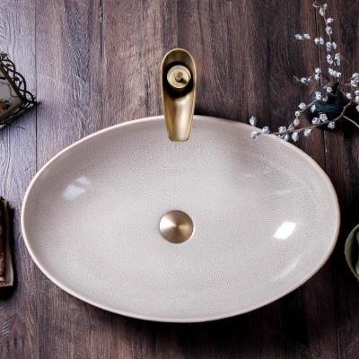 China 1300 Degree Fired Wholesale Handmade Jingdezhen Egg Sink Shape Ice Ceramic Ceramic Basin Basin for sale