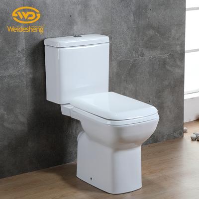 China Double-Flow Two-Piece Gravity Flush Ceramic Indian Hotel Toilet Lavatory for sale