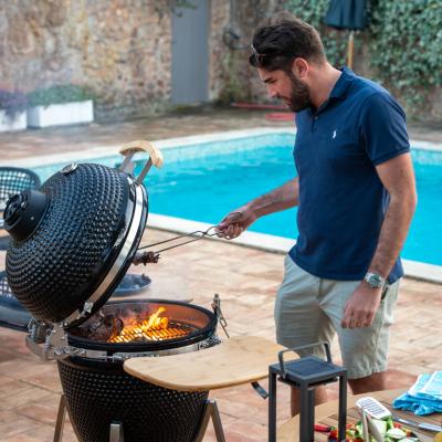 China Premium Ceramic Outdoor BBQ Smoker MERRY Charcoal Garden Charcoal Griddle Combo Easily Assembled Cooker with Humanized Cart and Beaming for sale