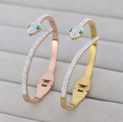 China CLASSIC hot sale snake head gold rhinestone bracelet full fashion temperament nails bracelet wholesale for sale