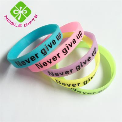 China Factory Direct Soft Silicone Rubber Hand Band Wristband With Country Name for sale