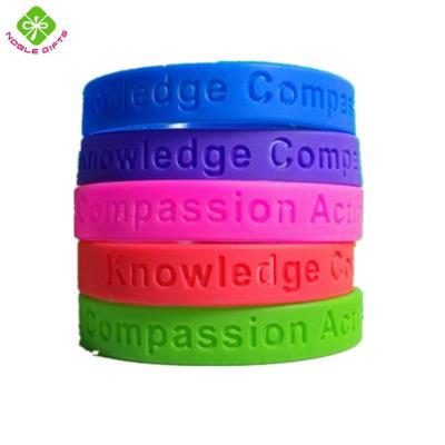 China Good Soft Custom Silicone Wrist Bands For Famous Brand for sale